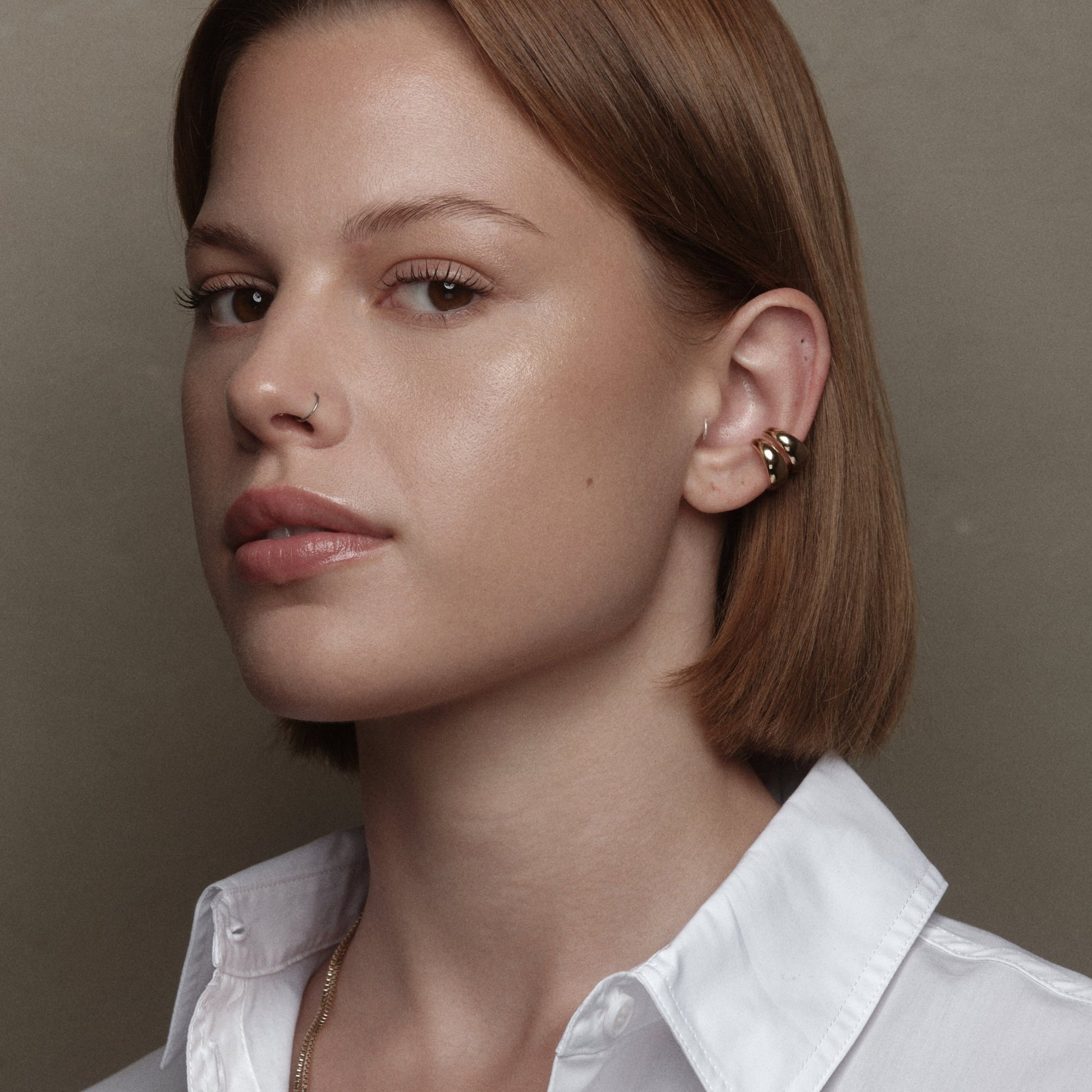 Piercing en argent plaqué or par Aurore Havenne