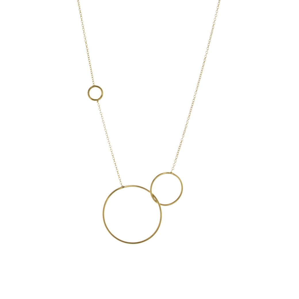 The gold plated silver Trinity necklace. A fine gold plated silver chain and three circles of different sizes.
